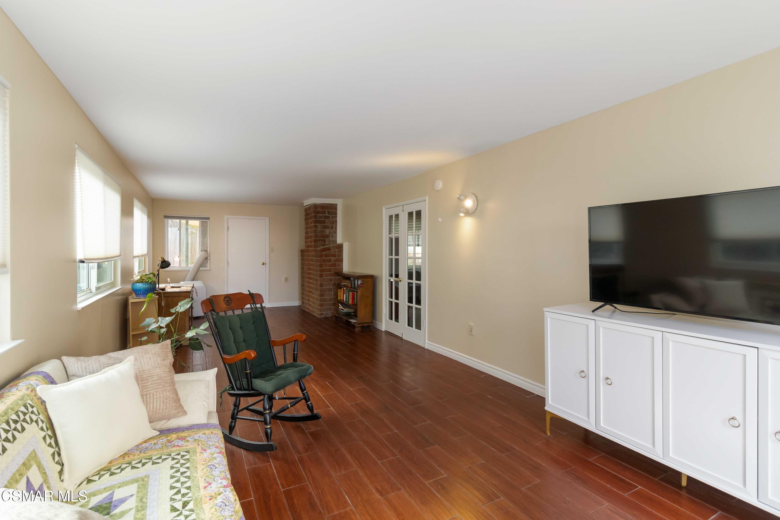 705 Wishard Avenue Simi Valley, CA 93065 - Photo 28 of 50 a living room with furniture and a flat screen tv