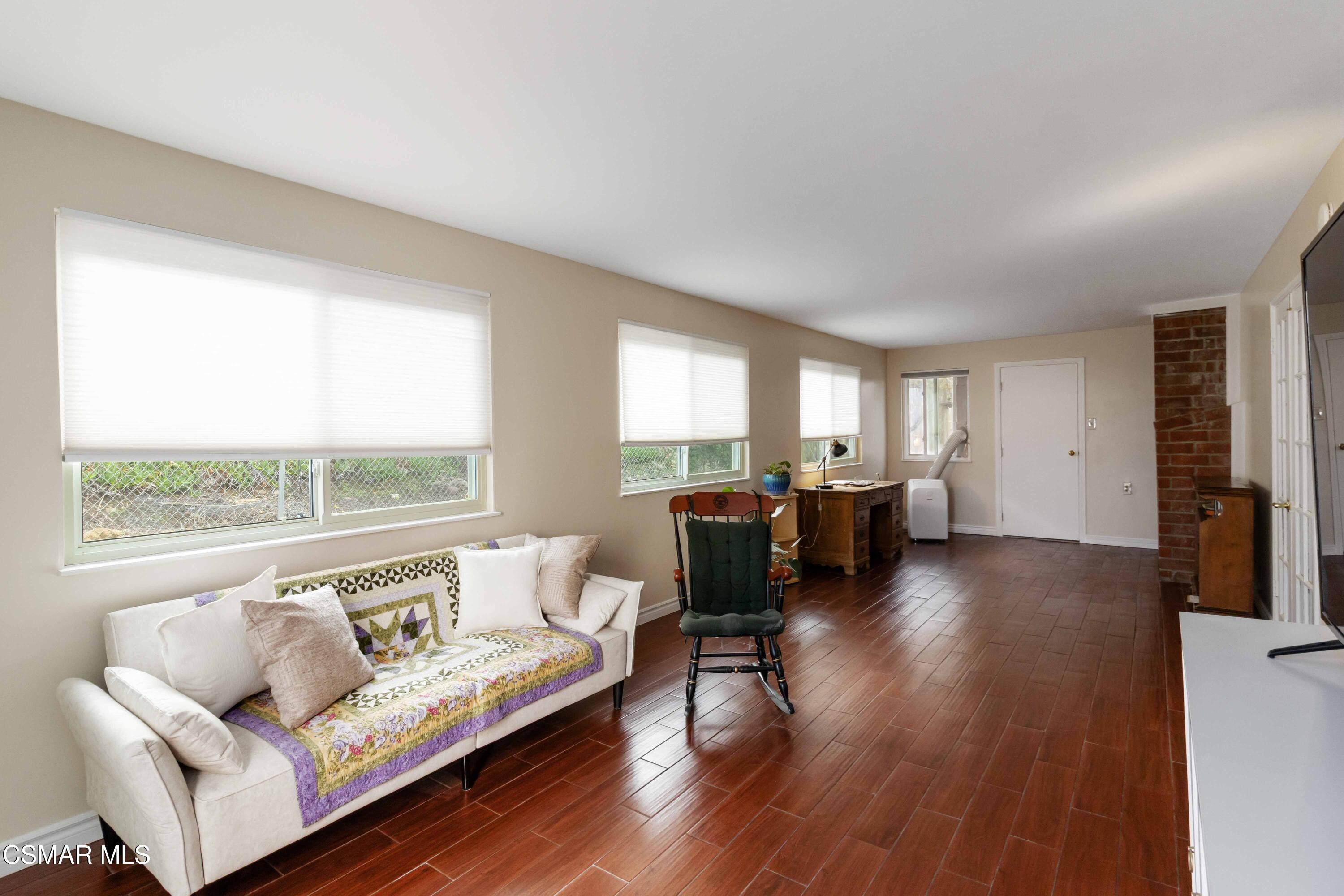 705 Wishard Avenue Simi Valley, CA 93065 - Photo 29 of 50 a living room with furniture and a large window