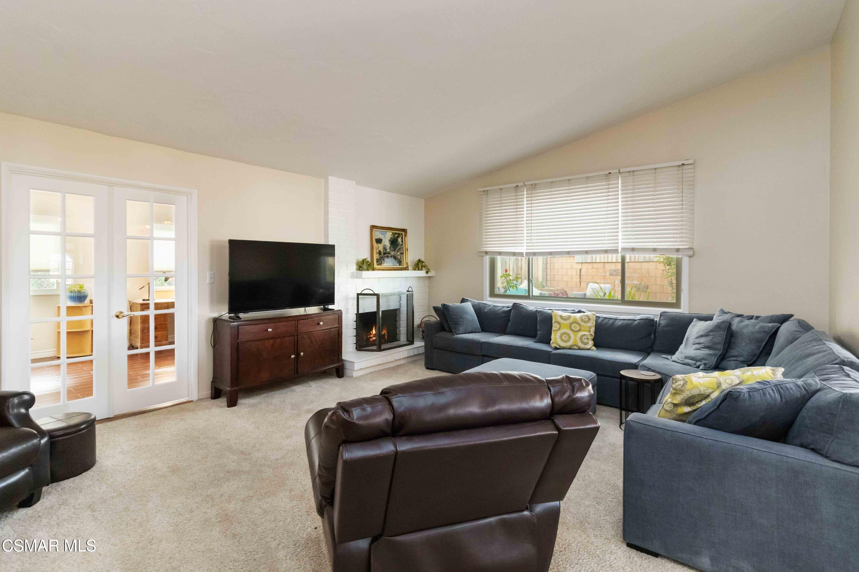 705 Wishard Avenue Simi Valley, CA 93065 - Photo 3 of 50 a living room with furniture and a flat screen tv