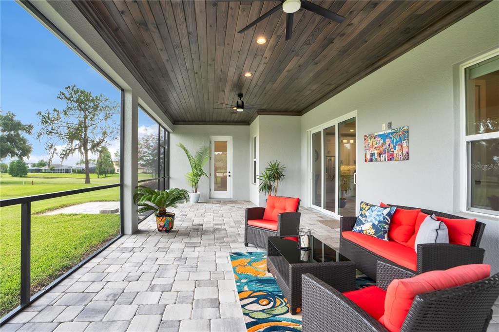 440 Palma Ceia Road Winter Haven, FL 33884 - Photo 52 of 78 a outdoor living space with furniture and garden view