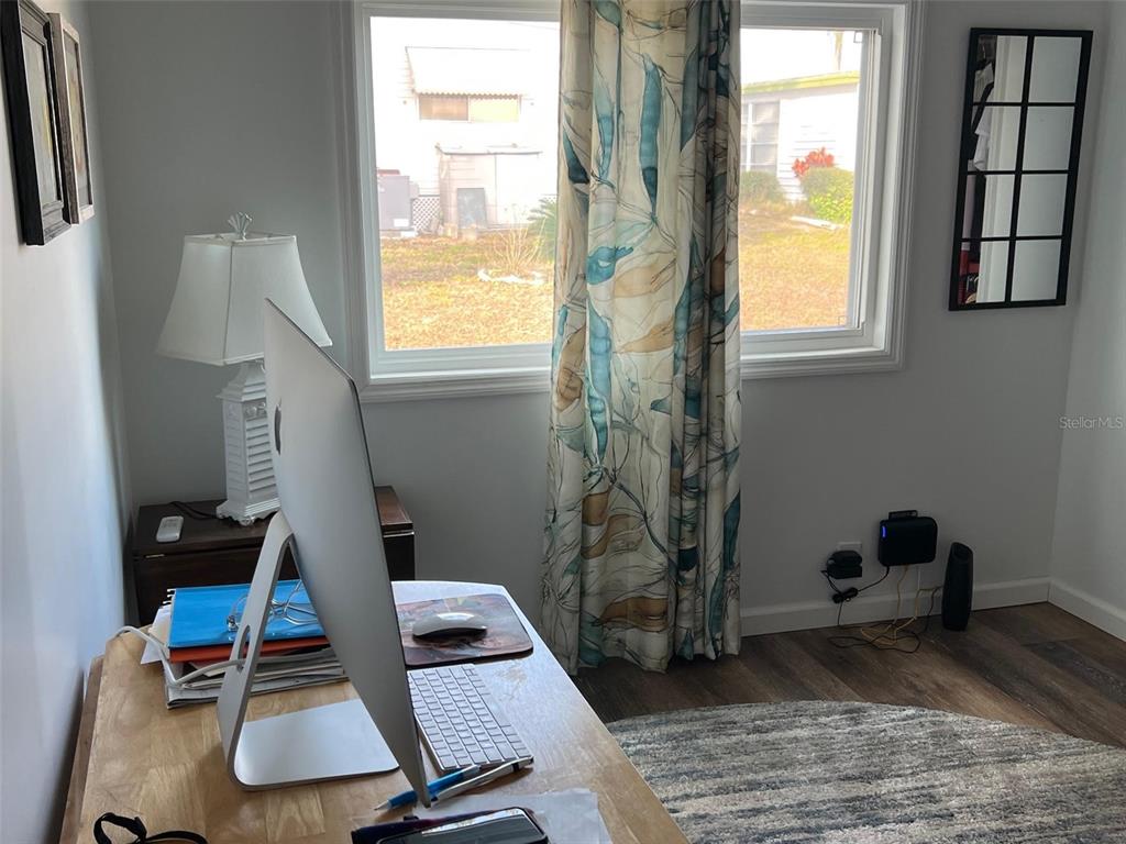 576 Queen Palm Largo, FL 33778 - Photo 20 of 33 a room with furniture and a window