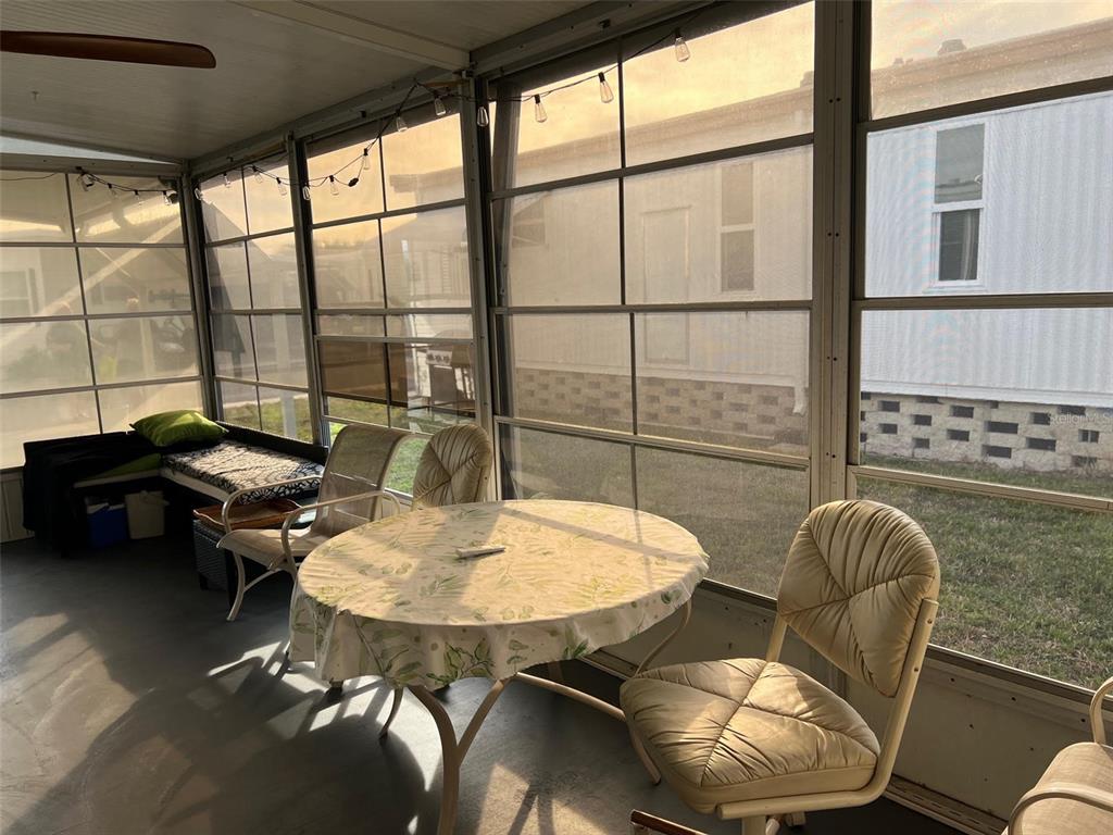 576 Queen Palm Largo, FL 33778 - Photo 31 of 33 a living room with furniture and a table