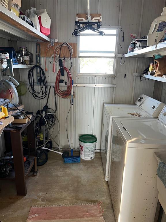 576 Queen Palm Largo, FL 33778 - Photo 33 of 33 a view of storage and utility room with washer and dryer