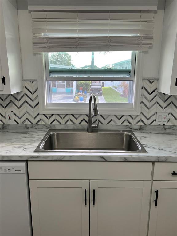 576 Queen Palm Largo, FL 33778 - Photo 7 of 33 a close view of sink and tap