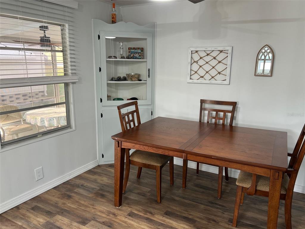 576 Queen Palm Largo, FL 33778 - Photo 9 of 33 a view of a dining room with furniture
