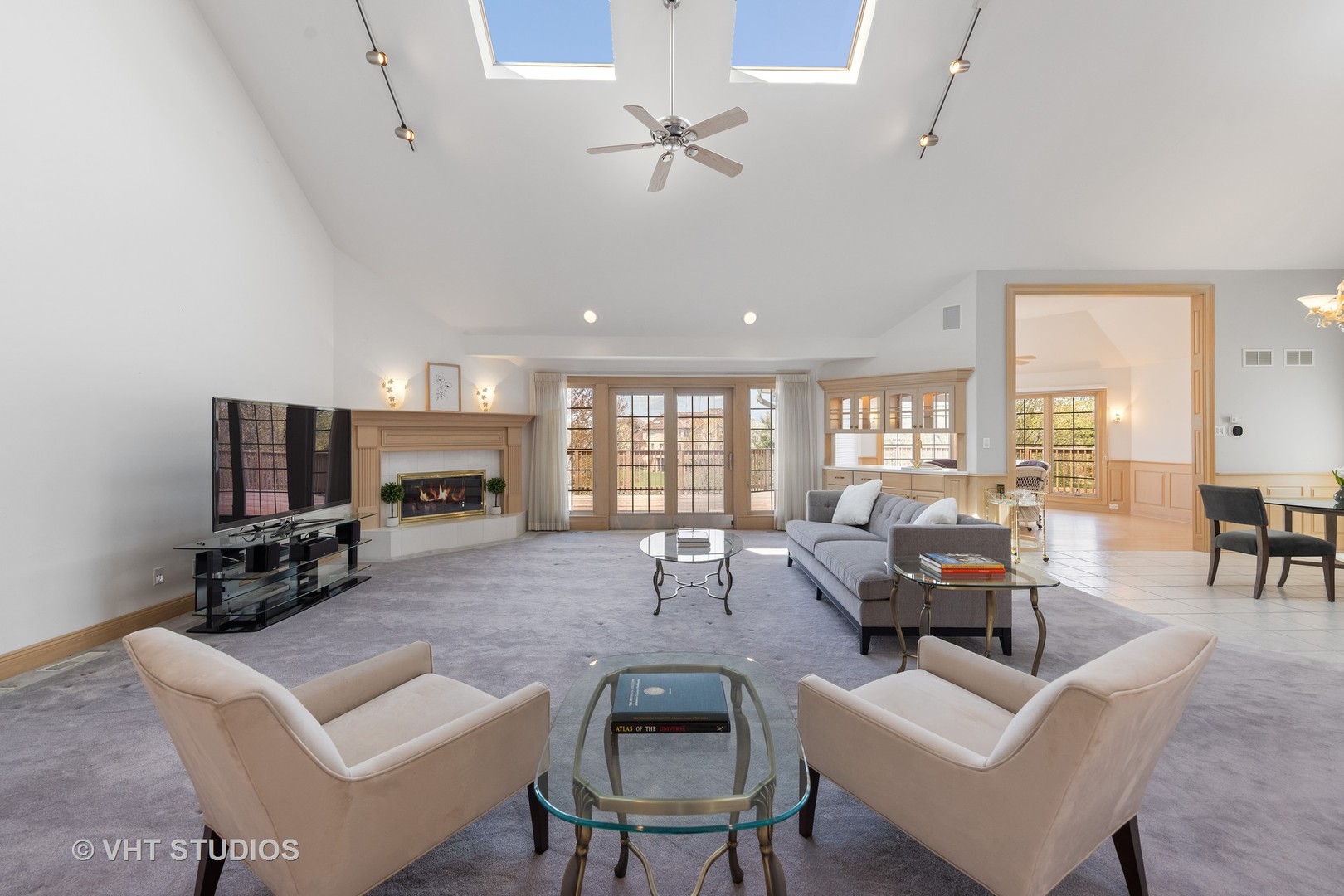 101 Windmill Road Orland Park, IL 60467 - Photo 12 of 56 a living room with furniture a fireplace and a flat screen tv