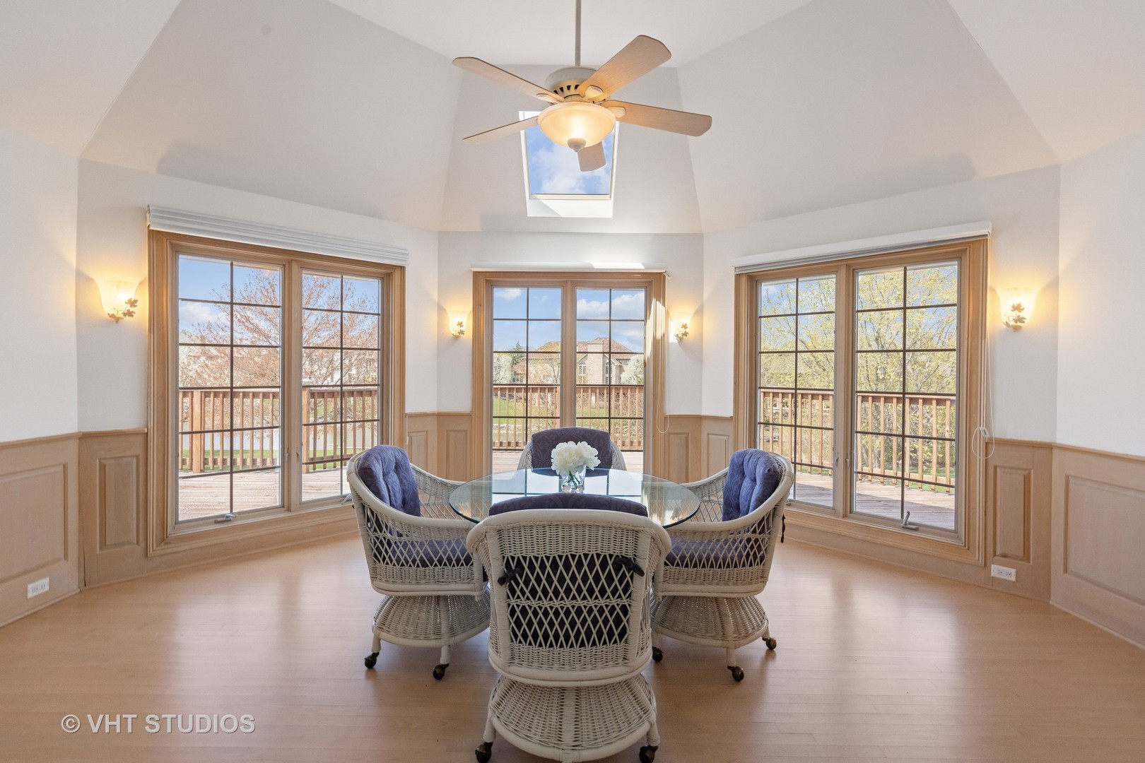 101 Windmill Road Orland Park, IL 60467 - Photo 15 of 56 a dining room with furniture a chandelier and wooden floor
