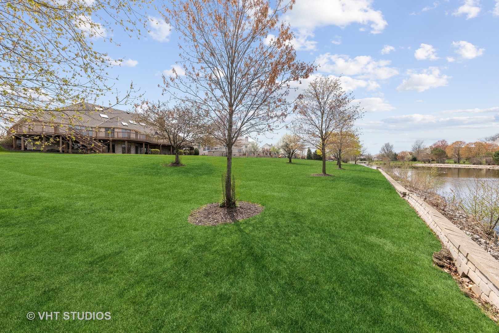 101 Windmill Road Orland Park, IL 60467 - Photo 51 of 56 a view of a backyard with large tree