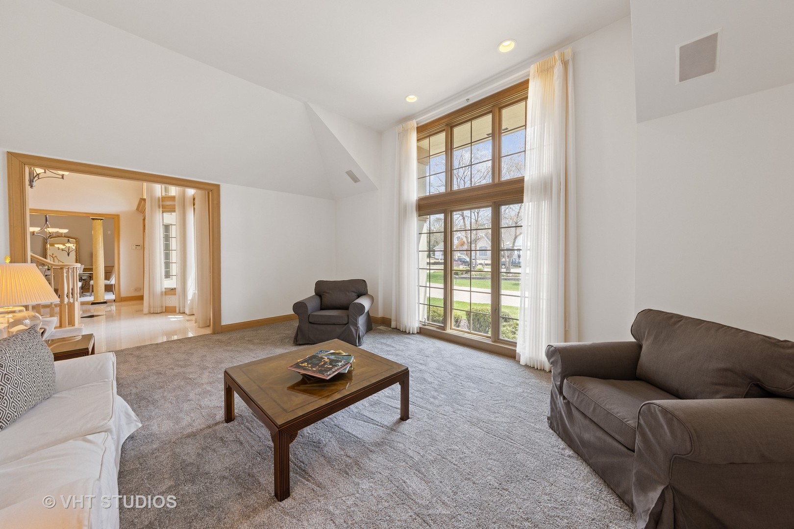 101 Windmill Road Orland Park, IL 60467 - Photo 7 of 56 a living room with furniture and a floor to ceiling window