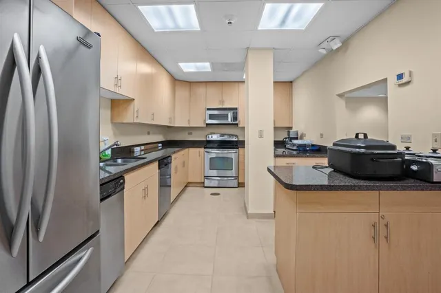 a view of a park with palm trees