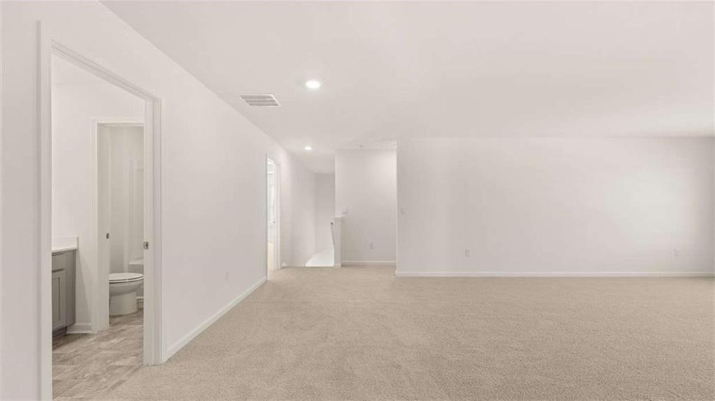 2262 Edgecombe Lane Dacula, GA 30019 - Photo 28 of 41 a view of an empty room