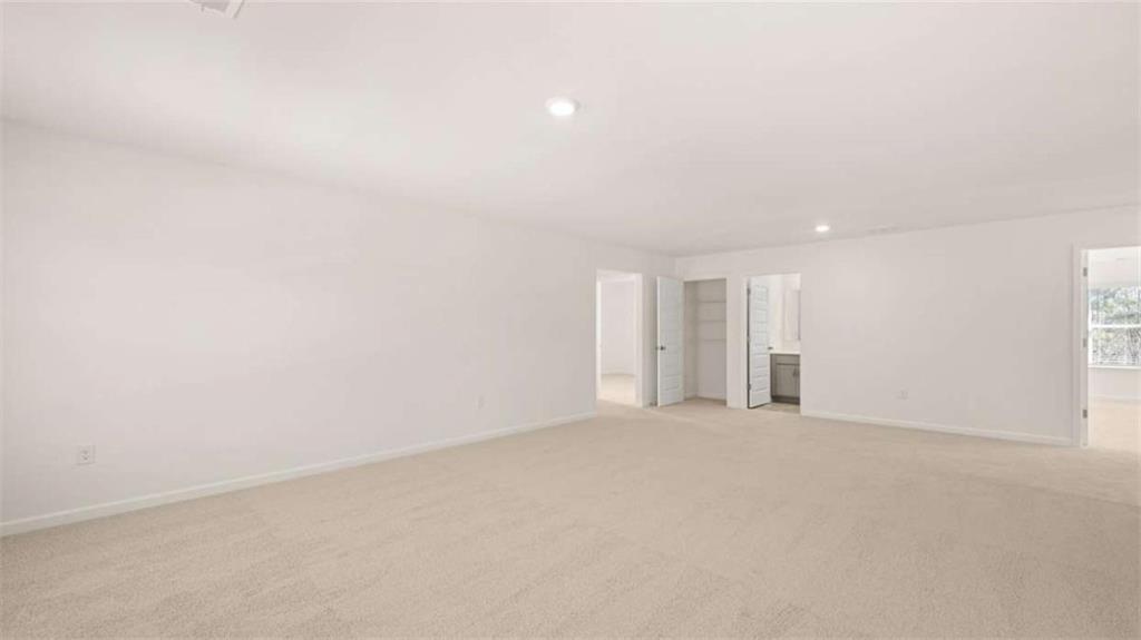 2262 Edgecombe Lane Dacula, GA 30019 - Photo 29 of 41 a view of an empty room