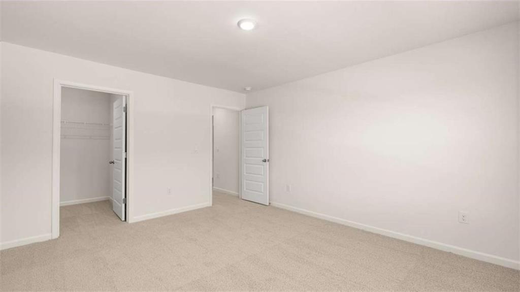 2262 Edgecombe Lane Dacula, GA 30019 - Photo 33 of 41 a view of an empty room