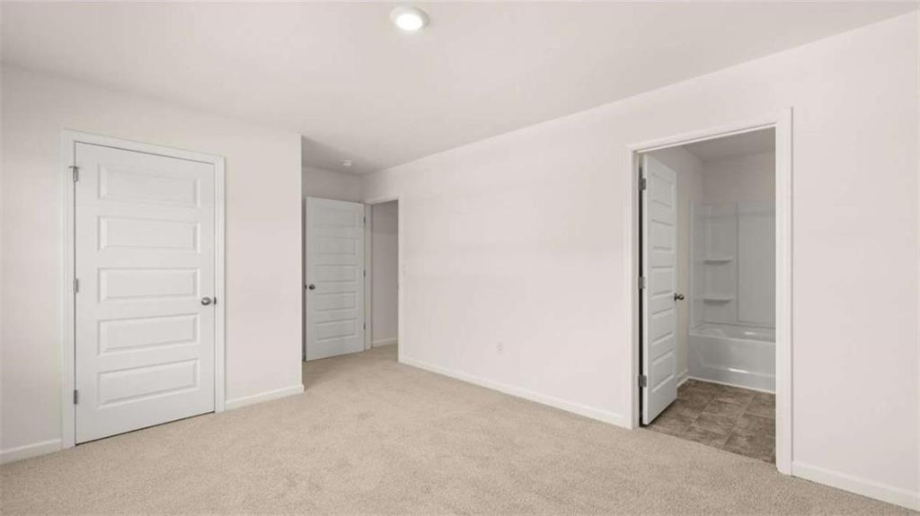 2262 Edgecombe Lane Dacula, GA 30019 - Photo 36 of 41 an empty room with closet area