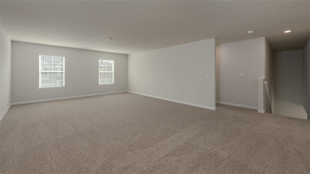 2262 Edgecombe Lane Dacula, GA 30019 - Photo 40 of 41 an empty room with windows