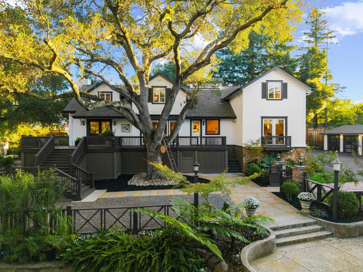 19050 Camino Barco Saratoga, CA 95070 - Photo 1 of 91 a front view of a house with a garden
