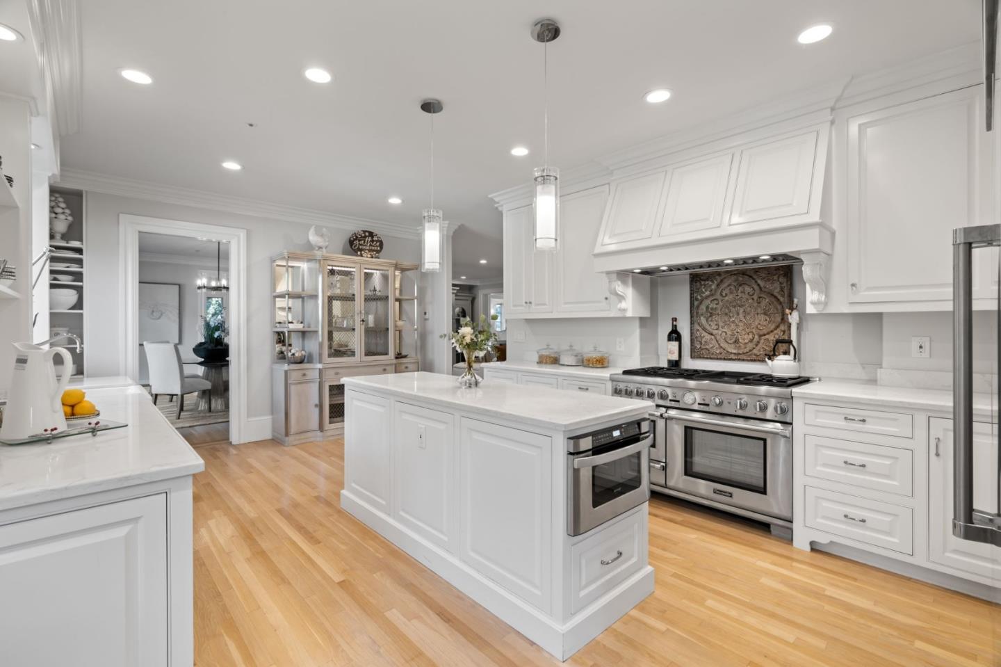 19050 Camino Barco Saratoga, CA 95070 - Photo 18 of 91 a kitchen with a stove sink and cabinets