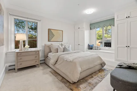 a bed room with a bed and furniture