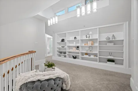 a kitchen with stainless steel appliances a stove a sink a refrigerator and cabinets