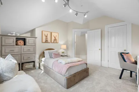 a view of a house with a street