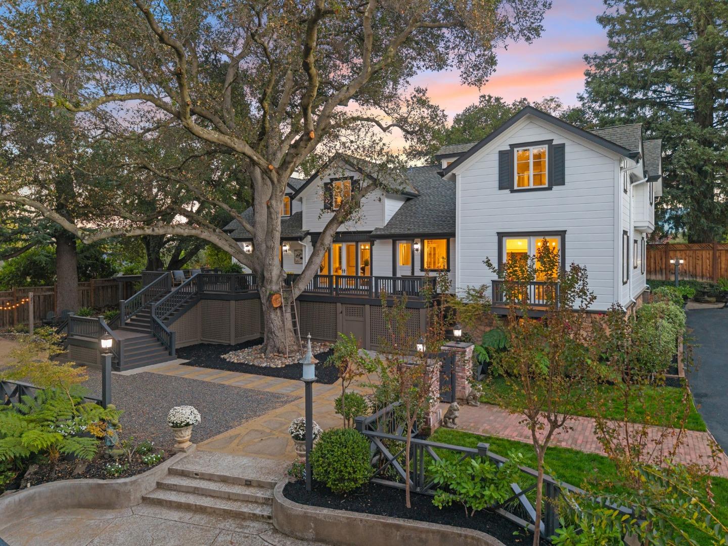 19050 Camino Barco Saratoga, CA 95070 - Photo 69 of 91 a front view of a house with a yard and potted plants