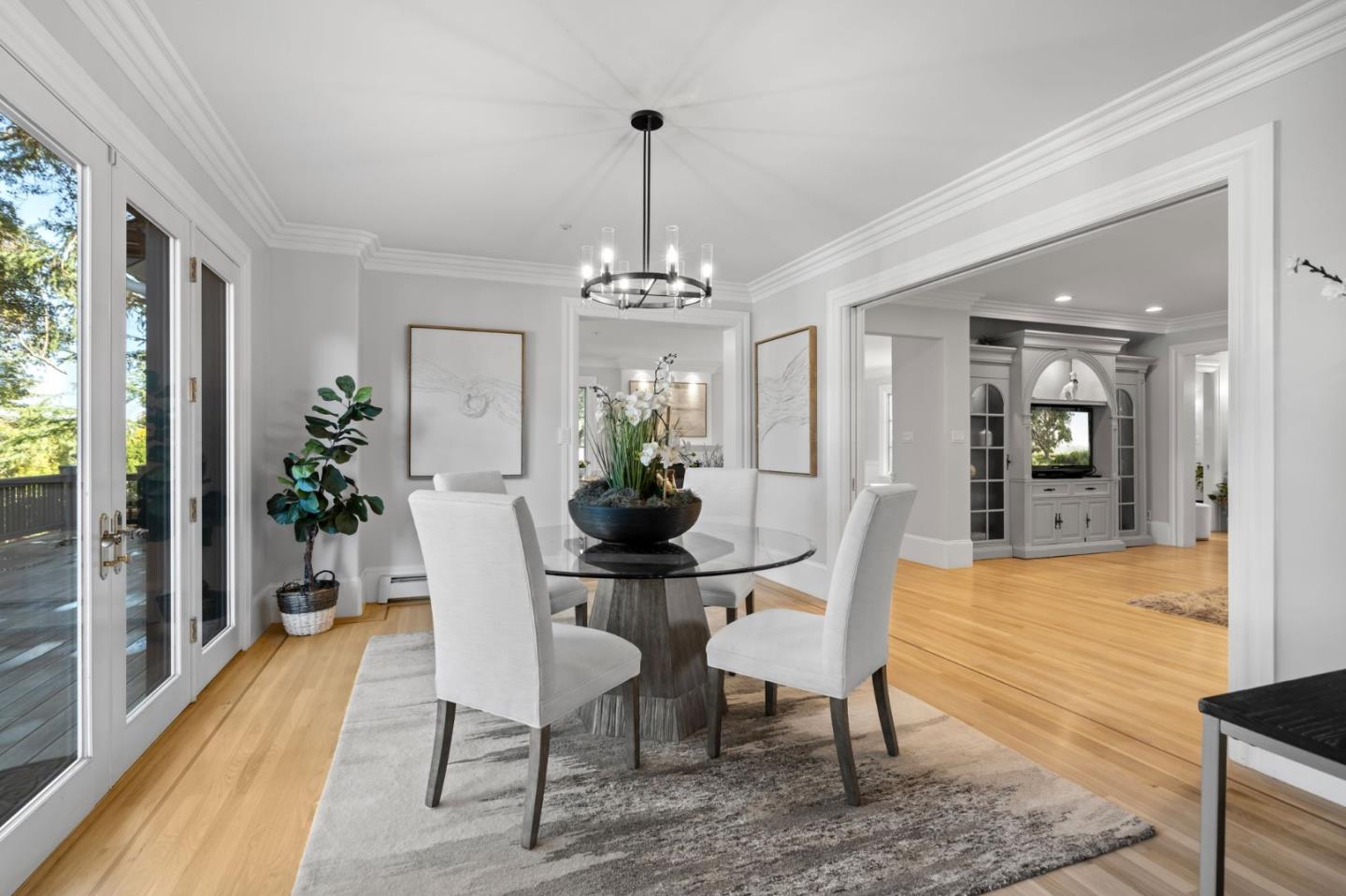 19050 Camino Barco Saratoga, CA 95070 - Photo 10 of 91 a dining room with furniture potted plants and wooden floor