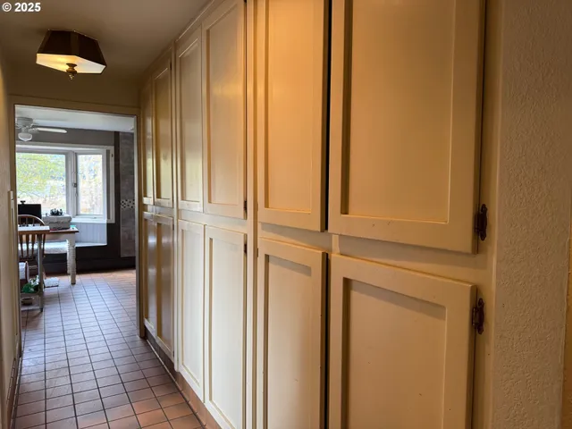 a kitchen with a sink a stove and a refrigerator