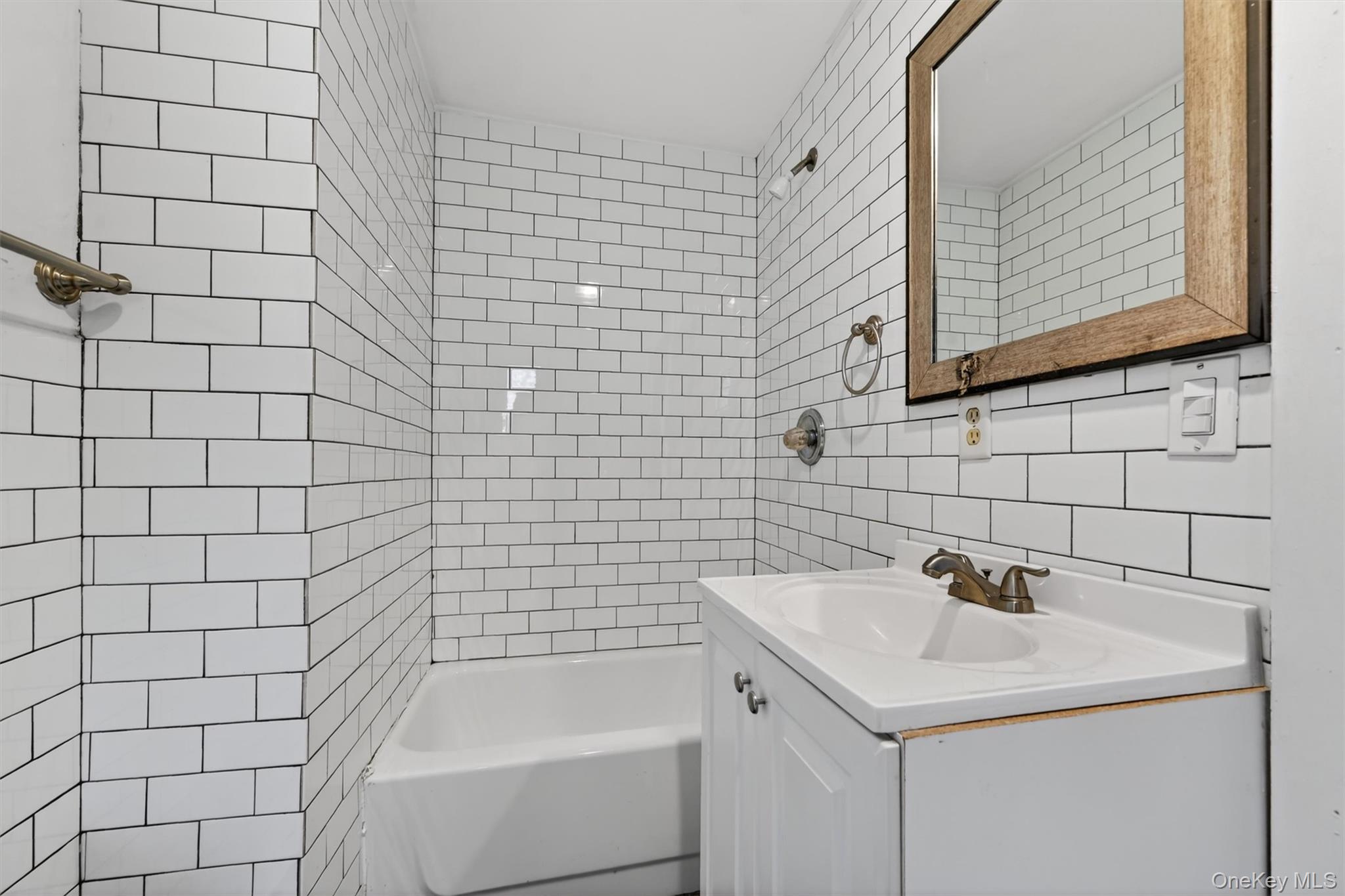 12 Perry Creek Road Washingtonville, NY 10992 - Photo 34 of 48 a bathroom with a sink and a bathtub