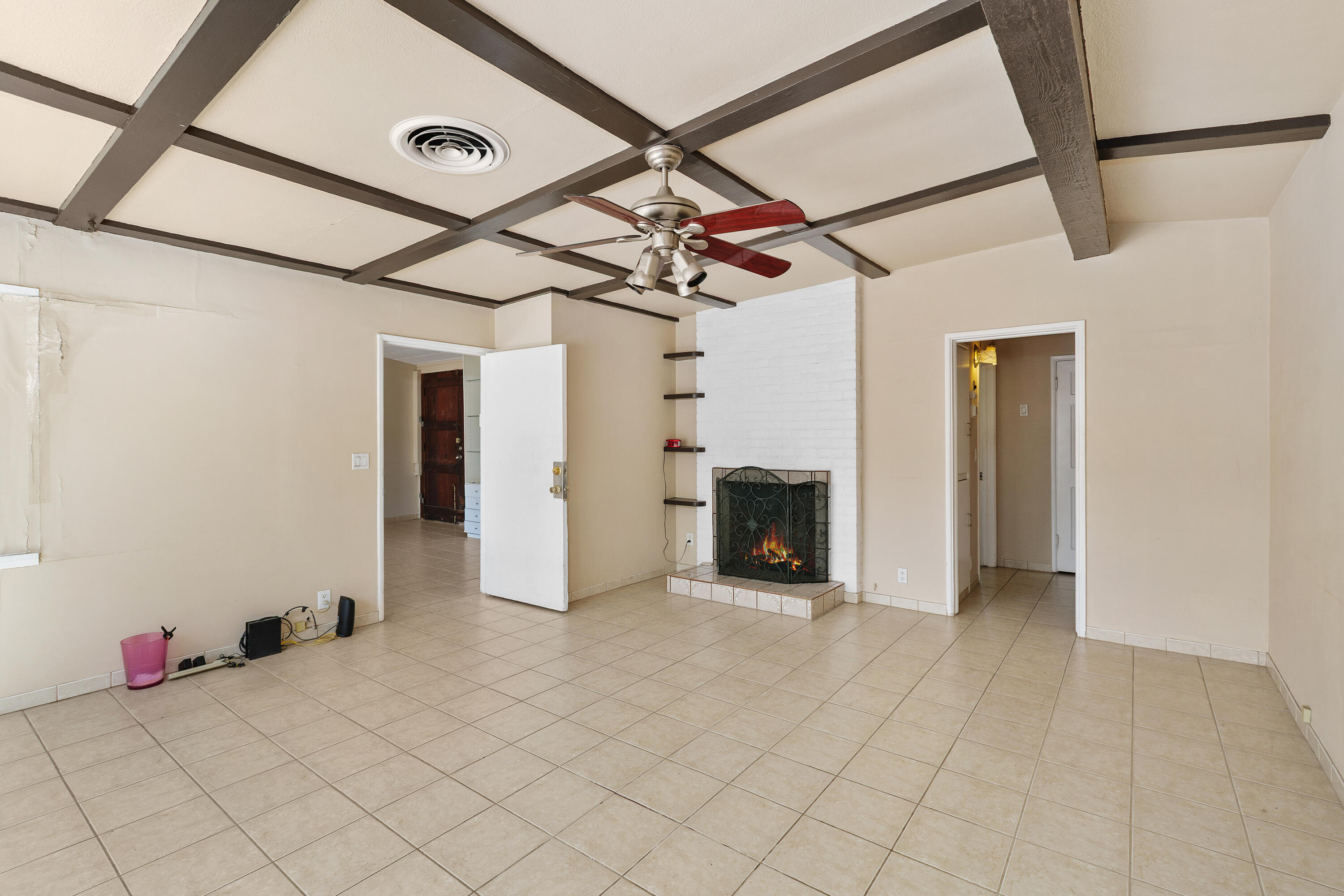 1077 South Riverside Drive Palm Springs, CA 92264 - Photo 14 of 35 a view of a livingroom with a fireplace