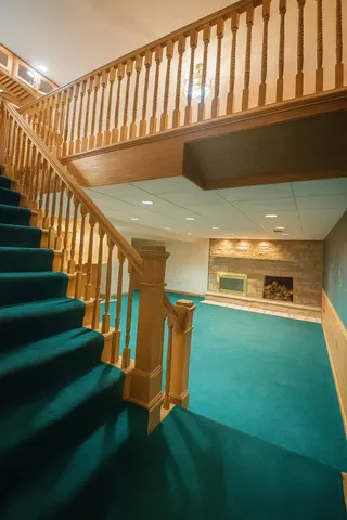 a kitchen with a refrigerator and a sink
