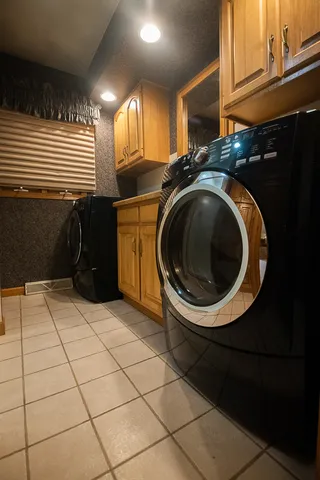 a bathroom with a sink a mirror and a shower