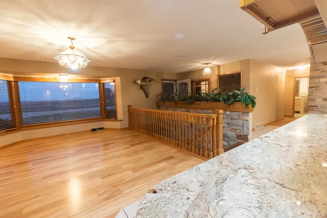 a view of a porch and a garage