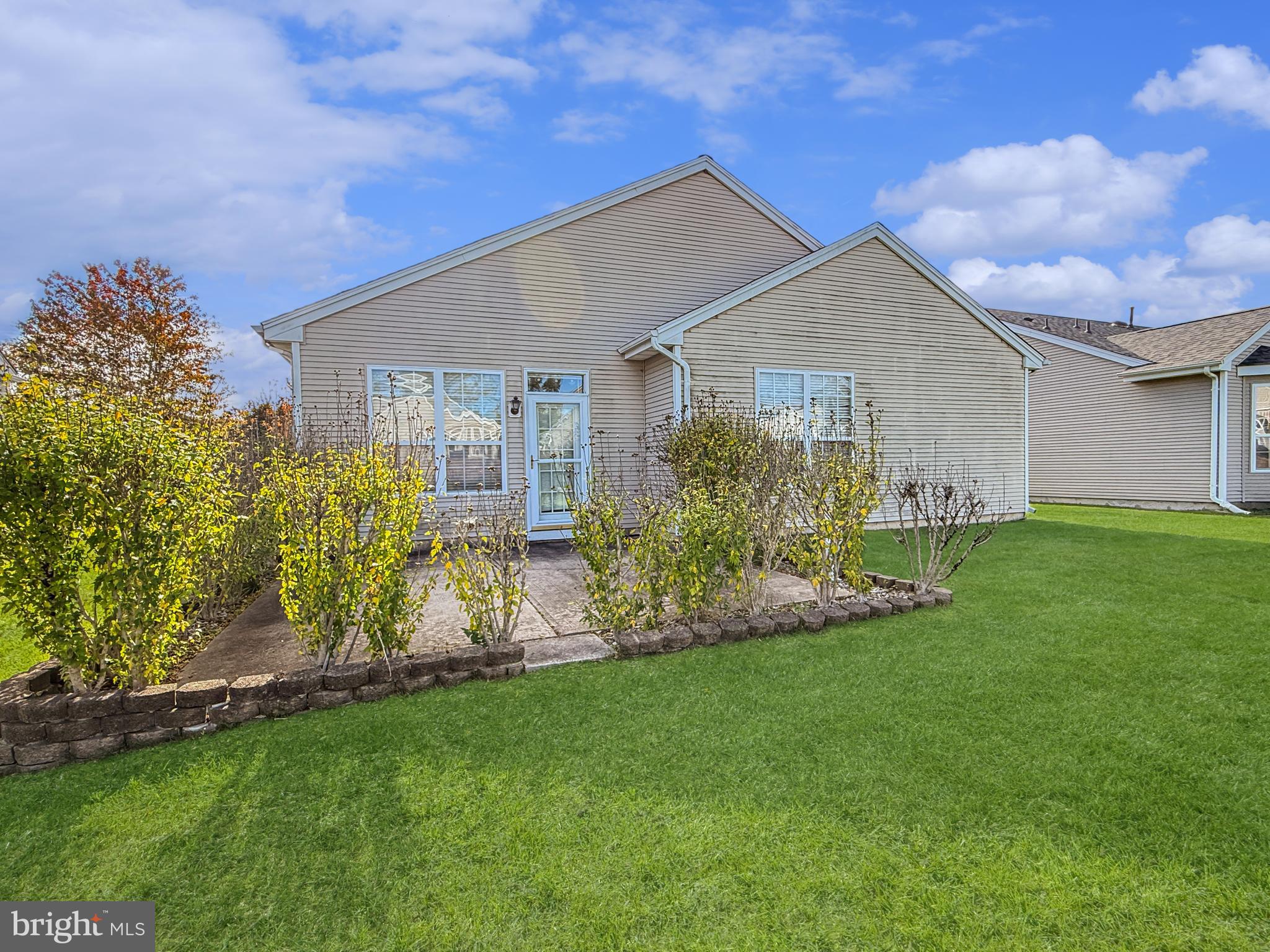 49 Chamber Lane Columbus, NJ 08022 - Photo 16 of 48 a front view of house with yard and green space