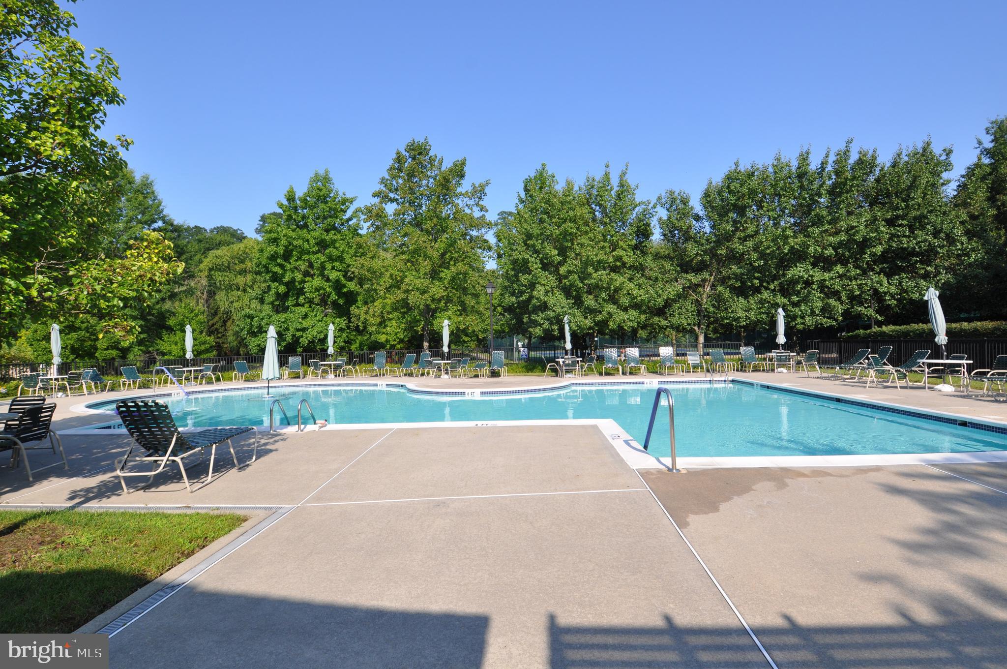 49 Chamber Lane Columbus, NJ 08022 - Photo 33 of 48 a view of a swimming pool with a patio