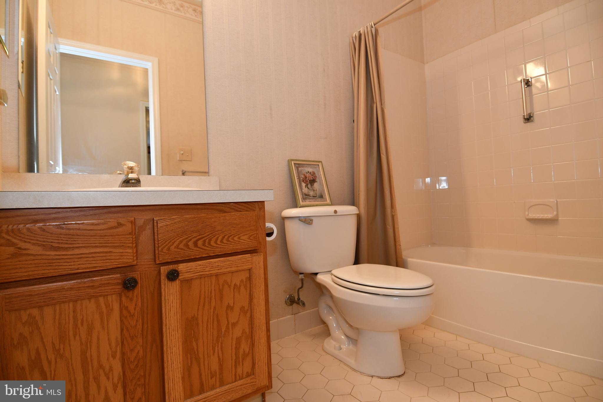 49 Chamber Lane Columbus, NJ 08022 - Photo 37 of 48 a bathroom with a sink a toilet and shower