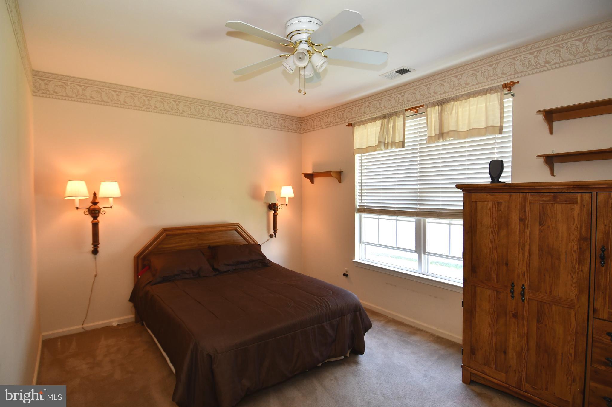49 Chamber Lane Columbus, NJ 08022 - Photo 38 of 48 a bedroom with a bed and window