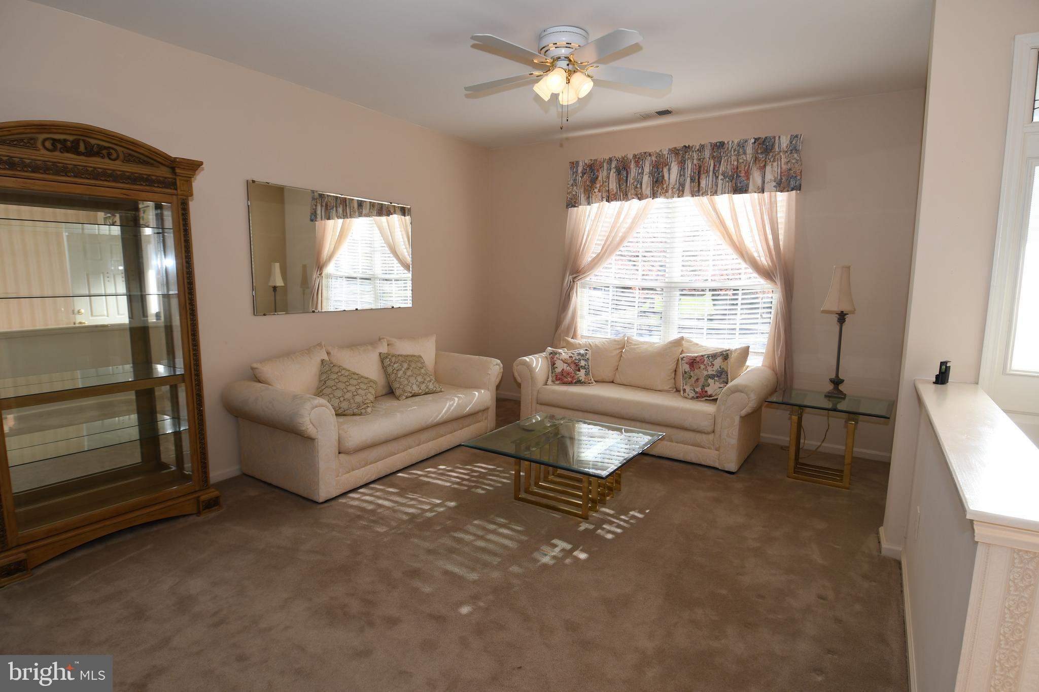 49 Chamber Lane Columbus, NJ 08022 - Photo 43 of 48 a living room with furniture and a large window