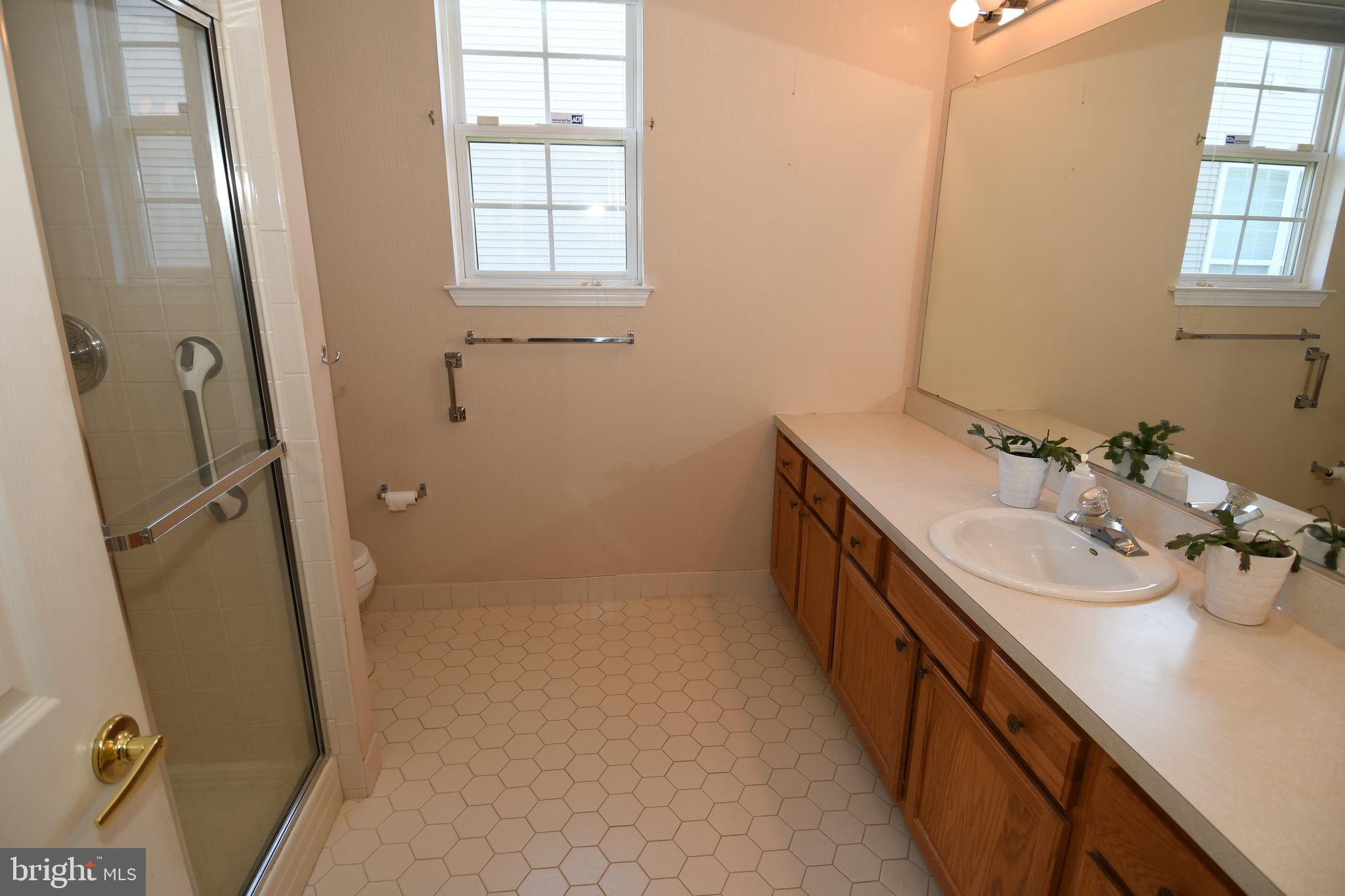 49 Chamber Lane Columbus, NJ 08022 - Photo 45 of 48 a bathroom with sink shower and mirror