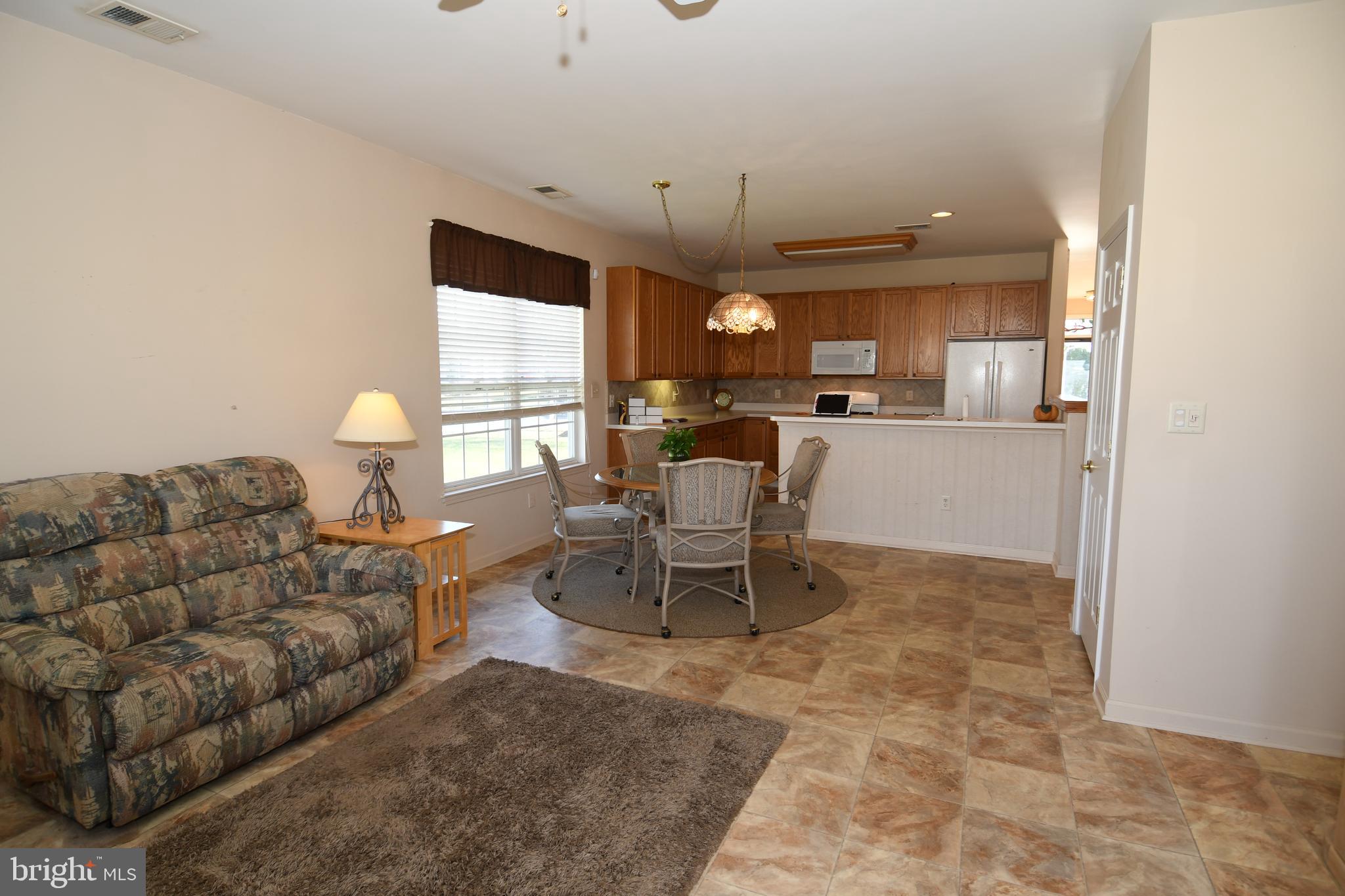 49 Chamber Lane Columbus, NJ 08022 - Photo 48 of 48 a living room with furniture and a large window