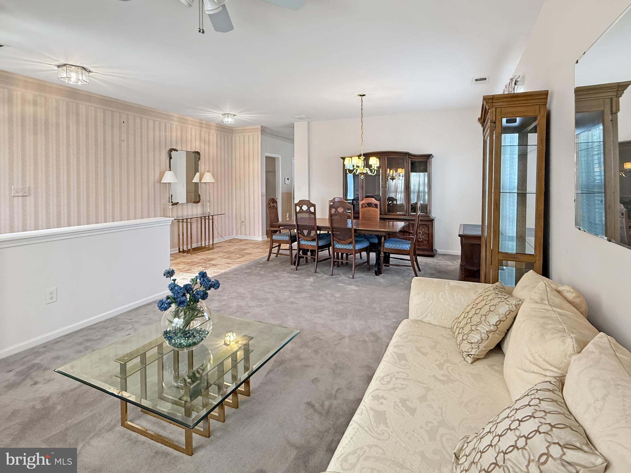 49 Chamber Lane Columbus, NJ 08022 - Photo 6 of 48 a living room with furniture and a chandelier