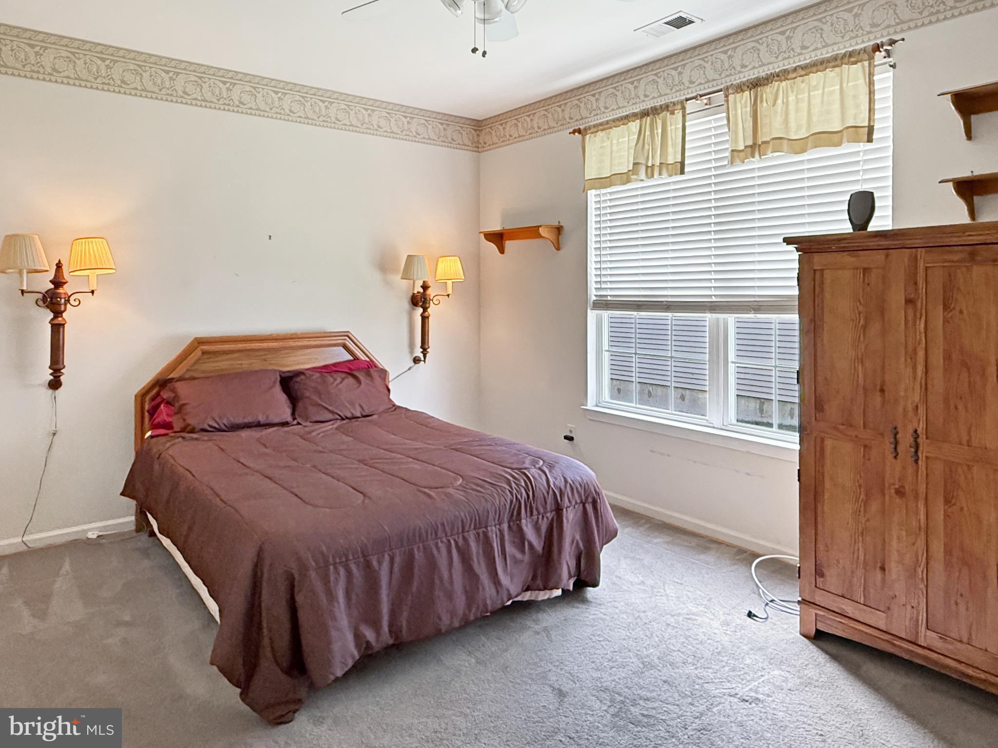 49 Chamber Lane Columbus, NJ 08022 - Photo 10 of 48 a bedroom with a bed and wooden floor
