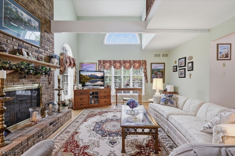 42 Copper Penny Road Flemington, NJ 08822 - Photo 8 of 39 a living room with furniture and a fireplace
