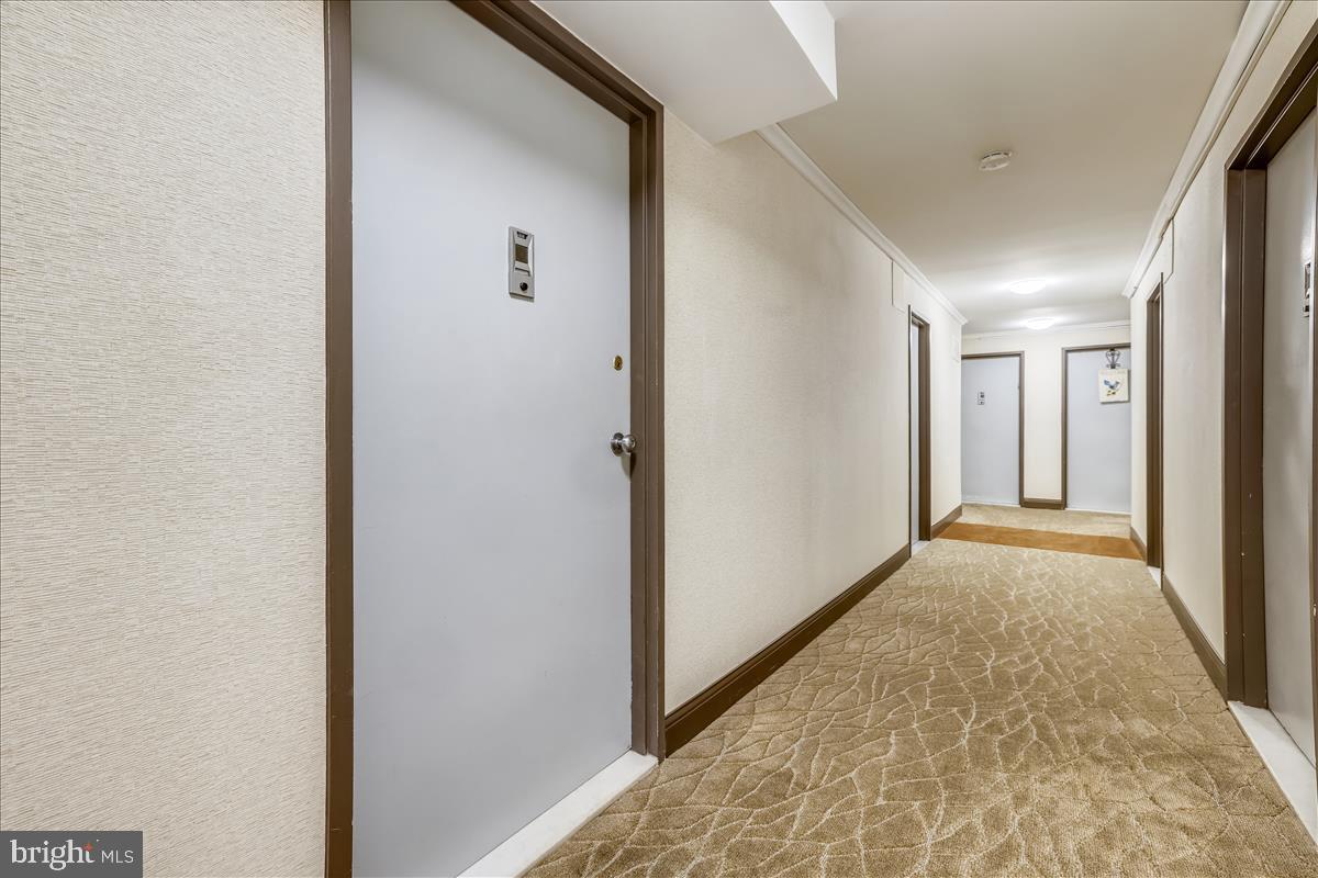 1900 Lyttonsville Road, Unit 1308 Silver Spring, MD 20910 - Photo 17 of 30 a view of hallway with livingroom