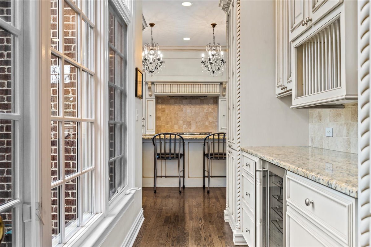 410 Cedar Street Winnetka, IL 60093 - Photo 13 of 57 a view of a kitchen with a sink and dishwasher
