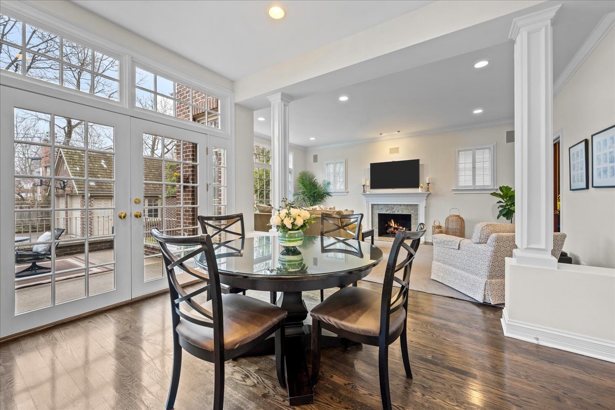 410 Cedar Street Winnetka, IL 60093 - Photo 21 of 57 a view of a dining room with furniture and wooden floor