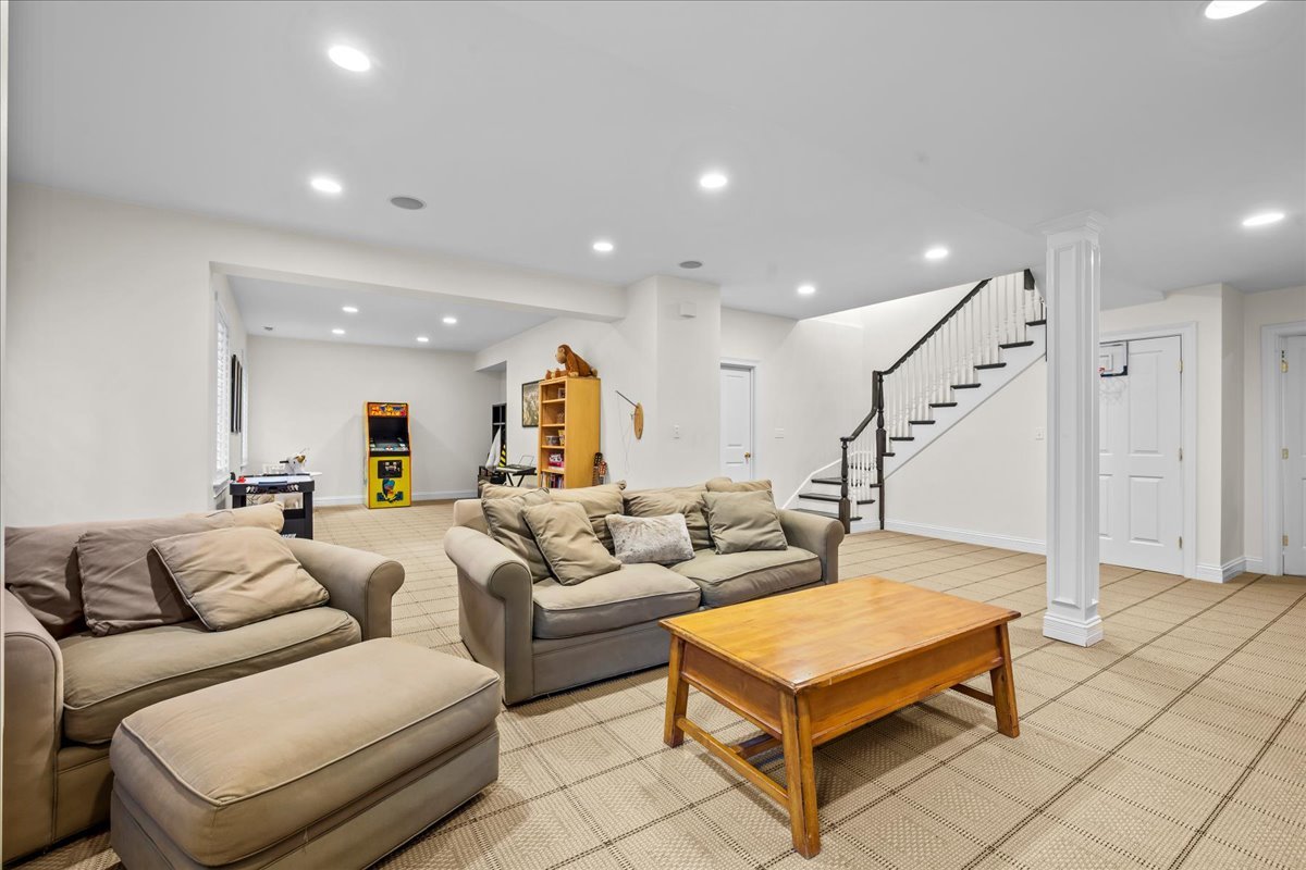 410 Cedar Street Winnetka, IL 60093 - Photo 43 of 57 a living room with furniture and a ceiling fan