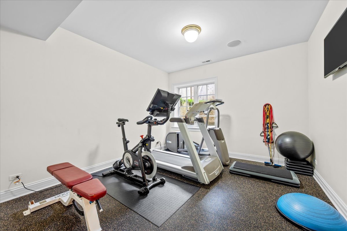 410 Cedar Street Winnetka, IL 60093 - Photo 45 of 57 a room with gym equipment