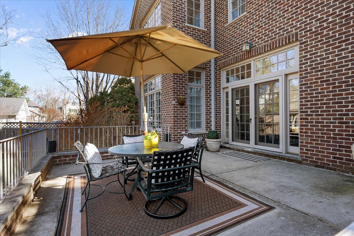 410 Cedar Street Winnetka, IL 60093 - Photo 49 of 57 a patio with table and chairs
