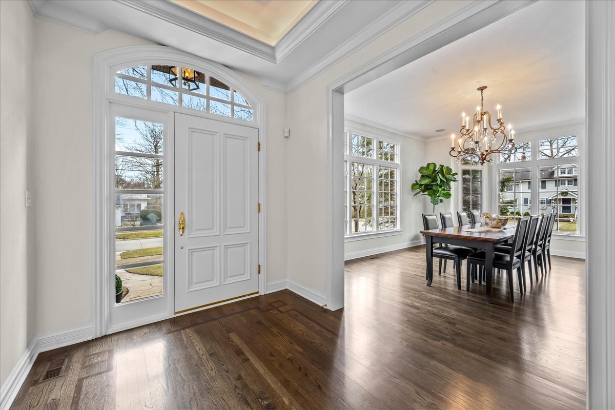 410 Cedar Street Winnetka, IL 60093 - Photo 6 of 57 a view of a dining room with furniture window and wooden floor