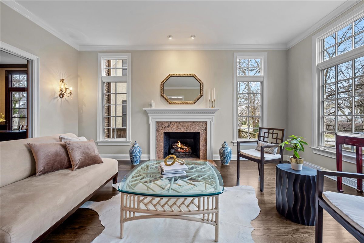 410 Cedar Street Winnetka, IL 60093 - Photo 10 of 57 a living room with furniture a fireplace and window